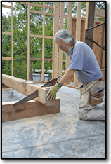 Measure Twice, Cut Once - Sam cutting post with great grandap's saw.